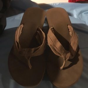 Brown flip flops